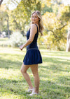 Solid Kourt Pleat Dress with Contrast Piping